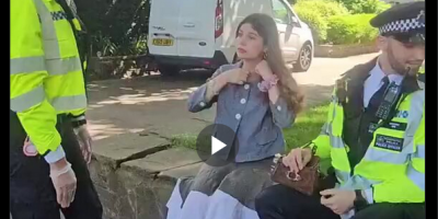 British police and female protestor