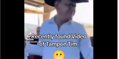 Walz dancing with dollar